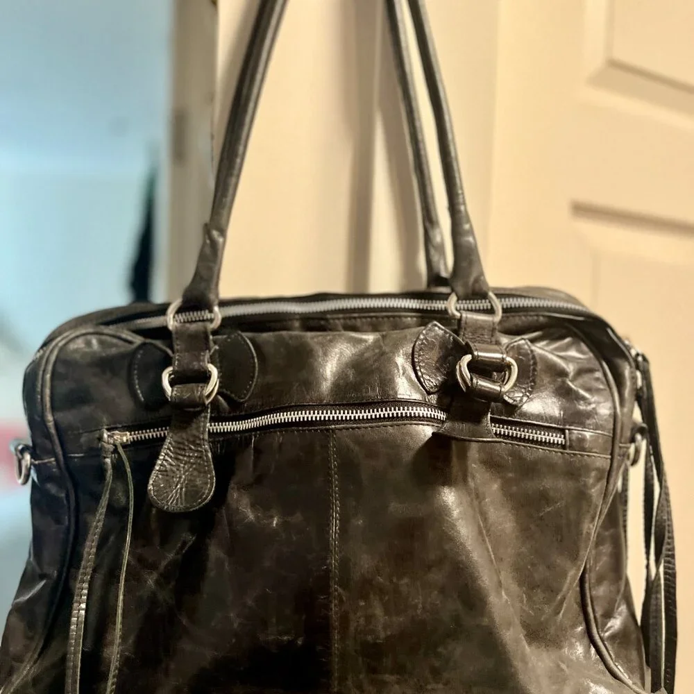 Vintage Latico Black Distressed Leather Laptop Bag with fringe details
